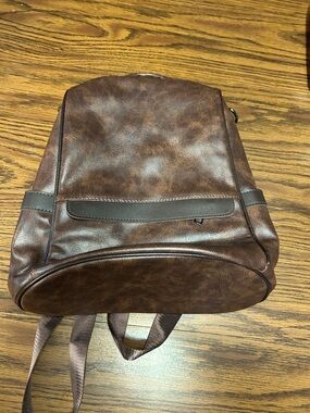 Women’s brown leather backpack